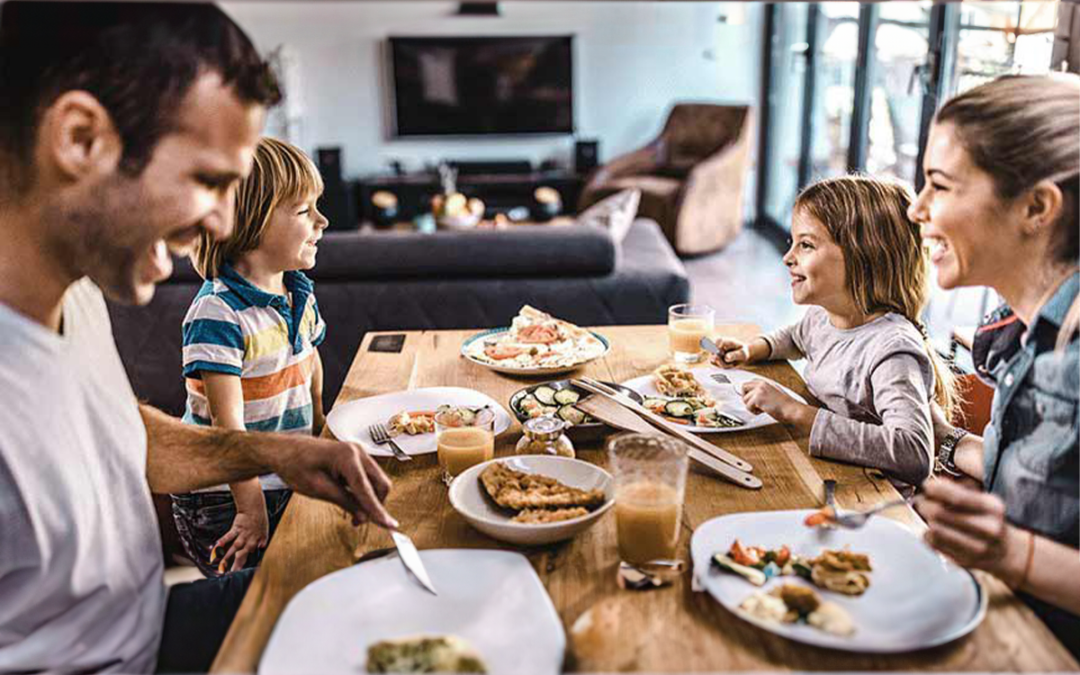 family eating dinner at the dinner table